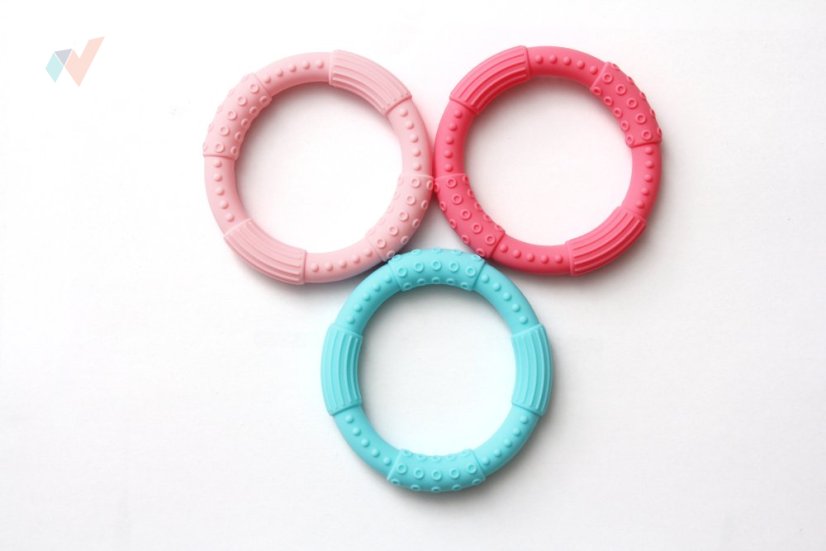 FyzioFlex Grab-it Circle - hryzátko s výstupkami pre menšie deti - Farba: Tyrkysová